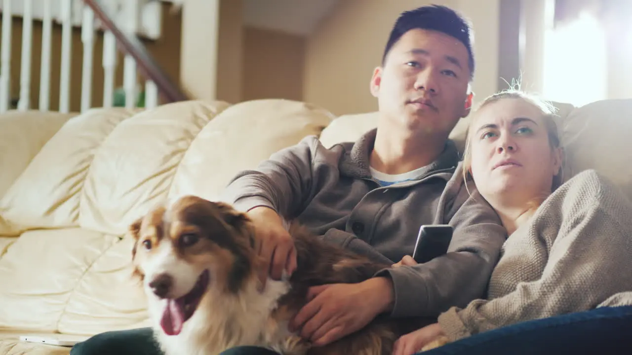 Young Multi-Etna Couple Watch Tv Together