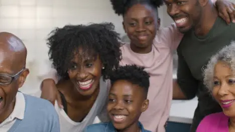 Happy Family Laughing and Smiling Together 