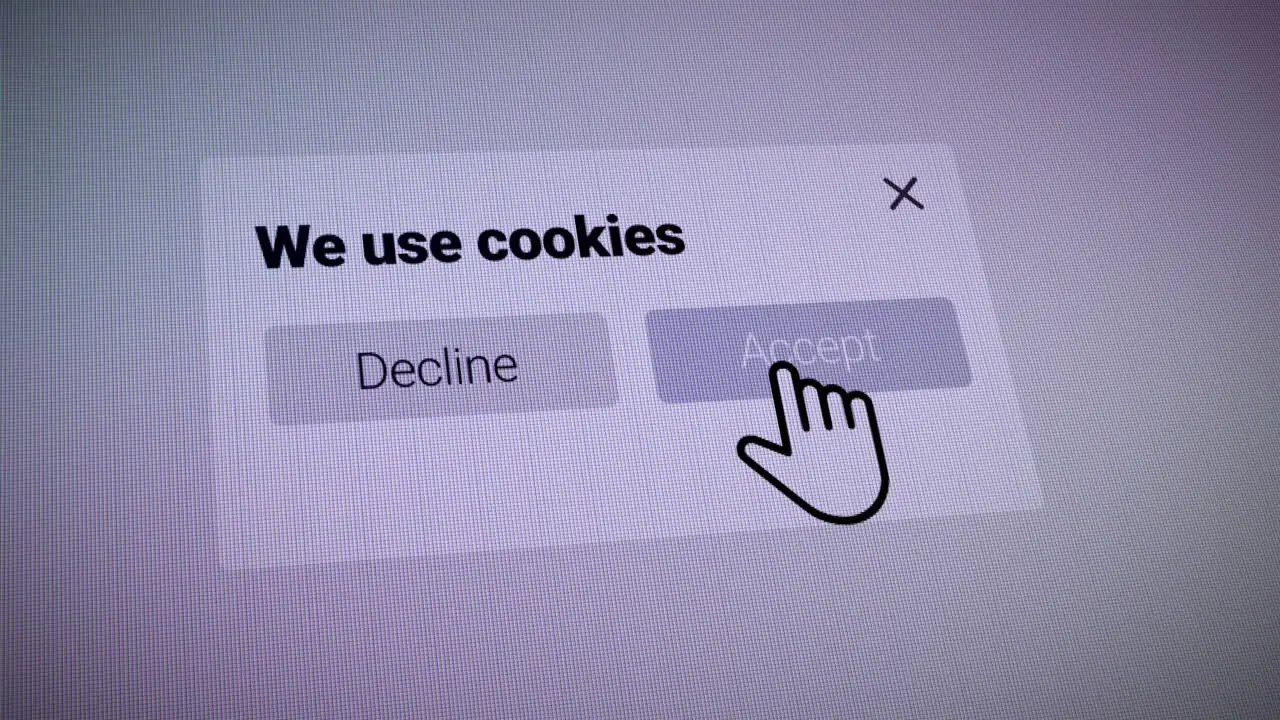 Mouse Cursor Clicking Accept Cookies notification on a Website