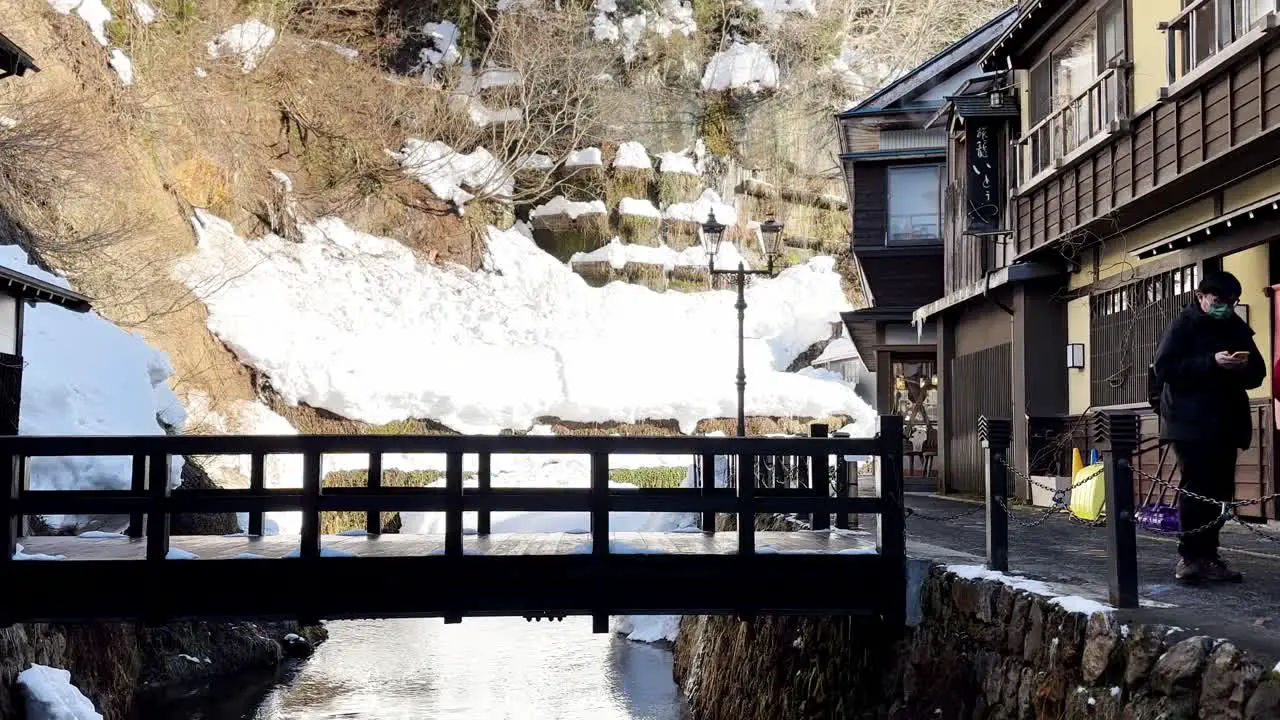 Asian Family Walking Together at Tourist Destination Ginzan Onzen Japan