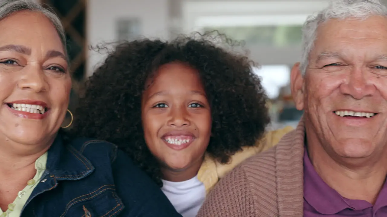 Grandparents children and smile sofa with face