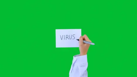 Doctor Writing Virus on Paper with Green Screen 01