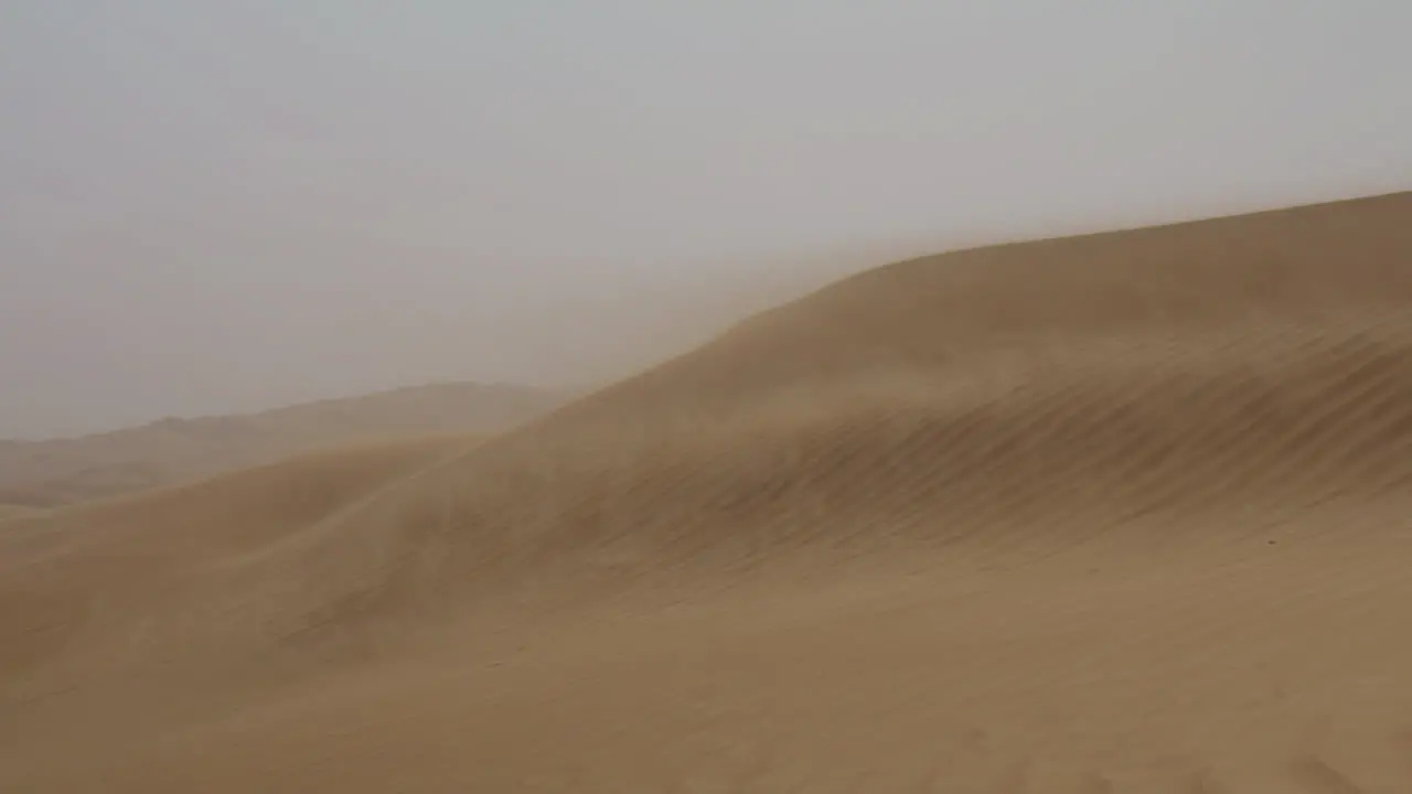 Wind Blowing Over Sand Dune In The Desert 6