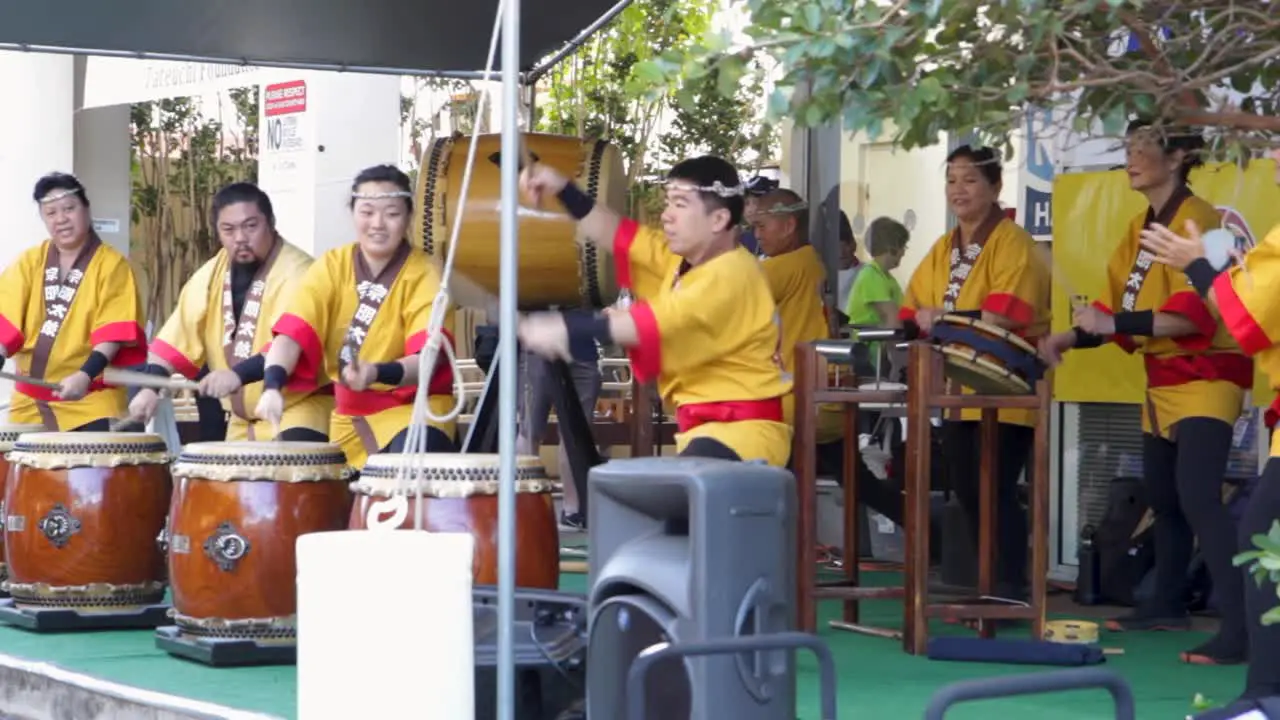 Japanese Taiko drummer performs drum solo at New Year festival