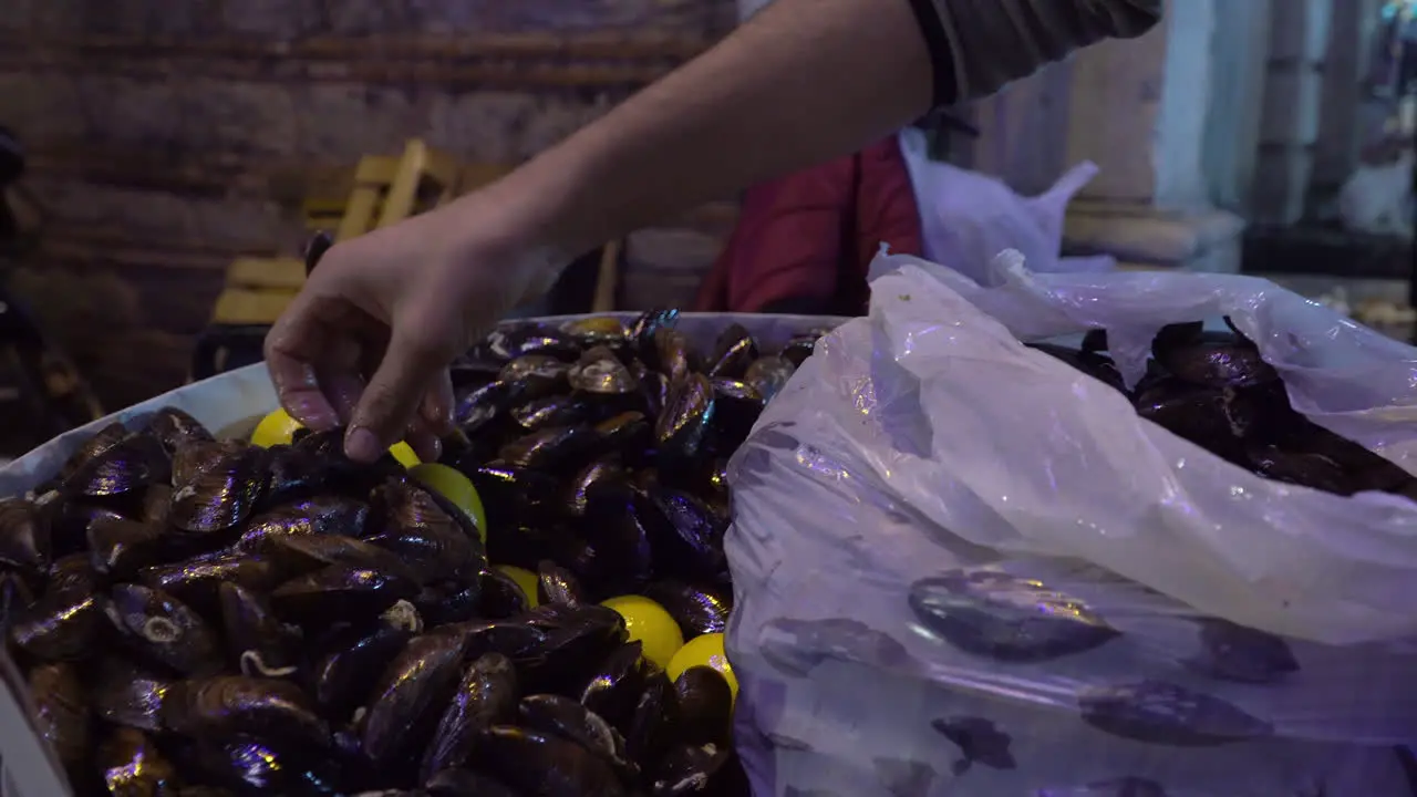 Stuffed Mussels Seller on Urban Streets of Istanbul at Night in Turkey