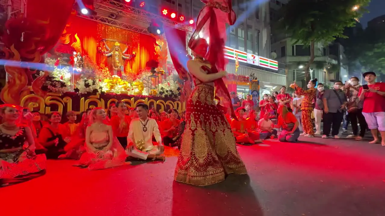 Lady devotees dancing at the Navaratri Festival in Bangkok Thailand