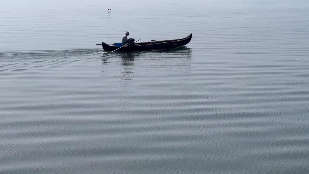 Aerial drone view A brother is going to pick up tourists with a boat