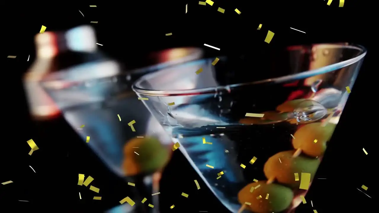 Glass of cocktail and confetti