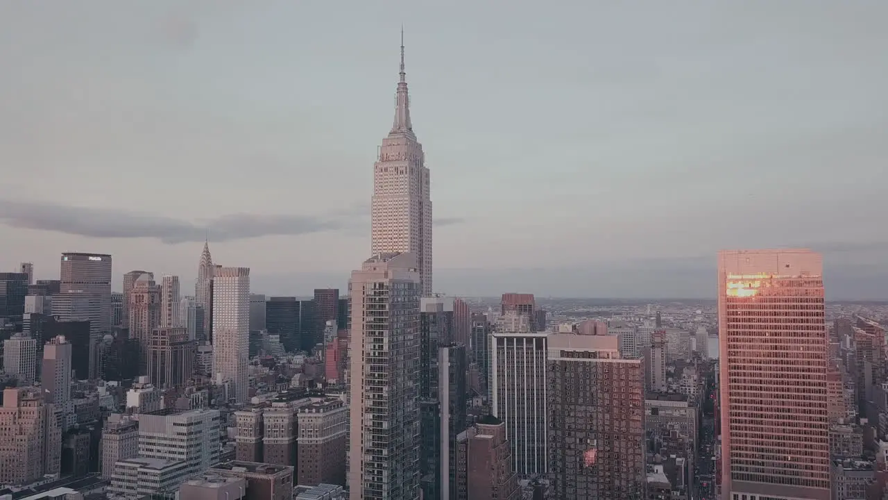 AERIAL View of Empire State Building at Dawn in Purple Light