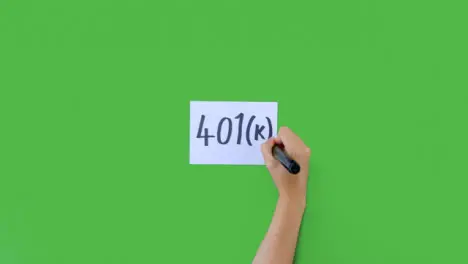 Woman Writing 401k on In Bold Paper with Green Screen