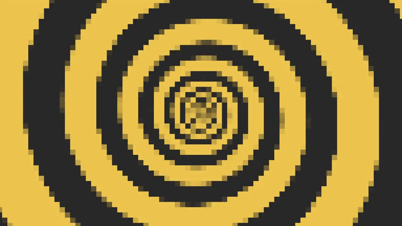 Yellow and black spiral comprised of circular black and yellow elements in a spiraling arrangement