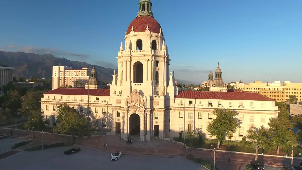 Aerial descending drone shot of the Pasadena City Hall Golden hour on a sunny evening in Pasadena California USA