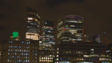 Skyline Of Modern Office Buildings In City Of London UK With The Cheesegrater And The Walkie Talkie At Night