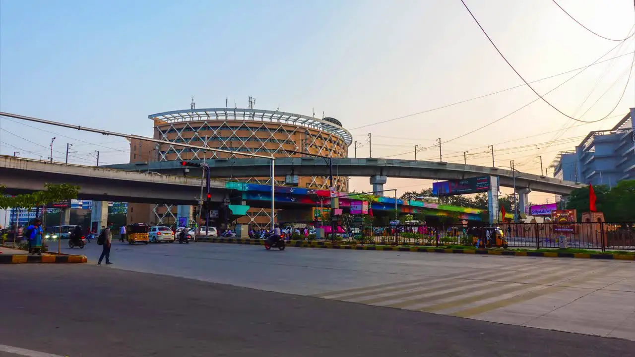 Time lapse on the beautiful high tech city Hyderabad of high building in front of the bridge and the people in vehicles moving on the road