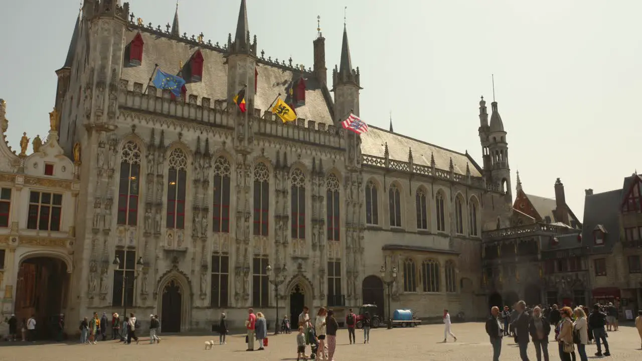 Tourist Visit Around Bruges City Hall And Basilica Of The Holy Blood At Main Square In Bruges Belgium