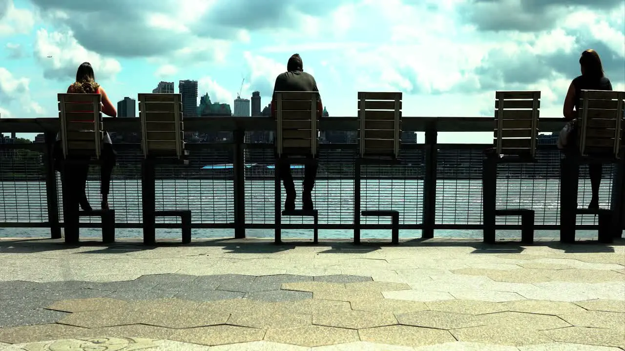 New Yorkers eating lunch looking out onto Hudson Bay