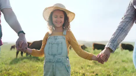 Farmer family and girl with parents at cattle