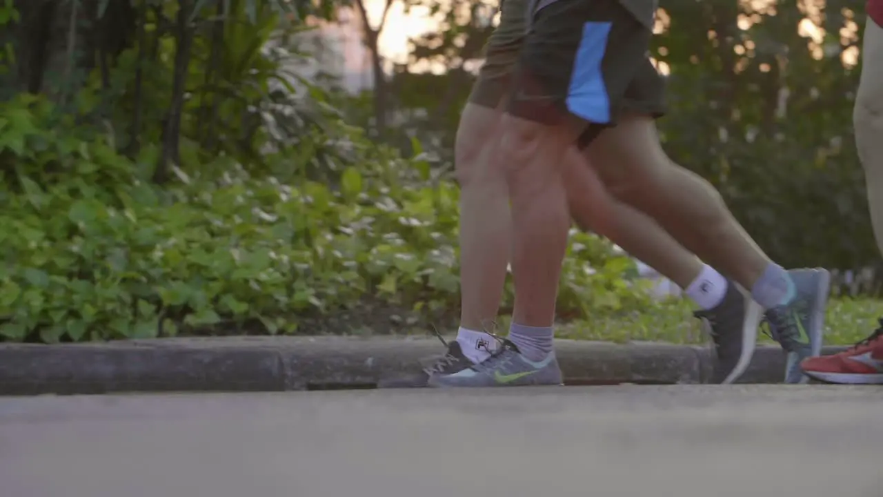 Legs of Joggers in Lumpini Park