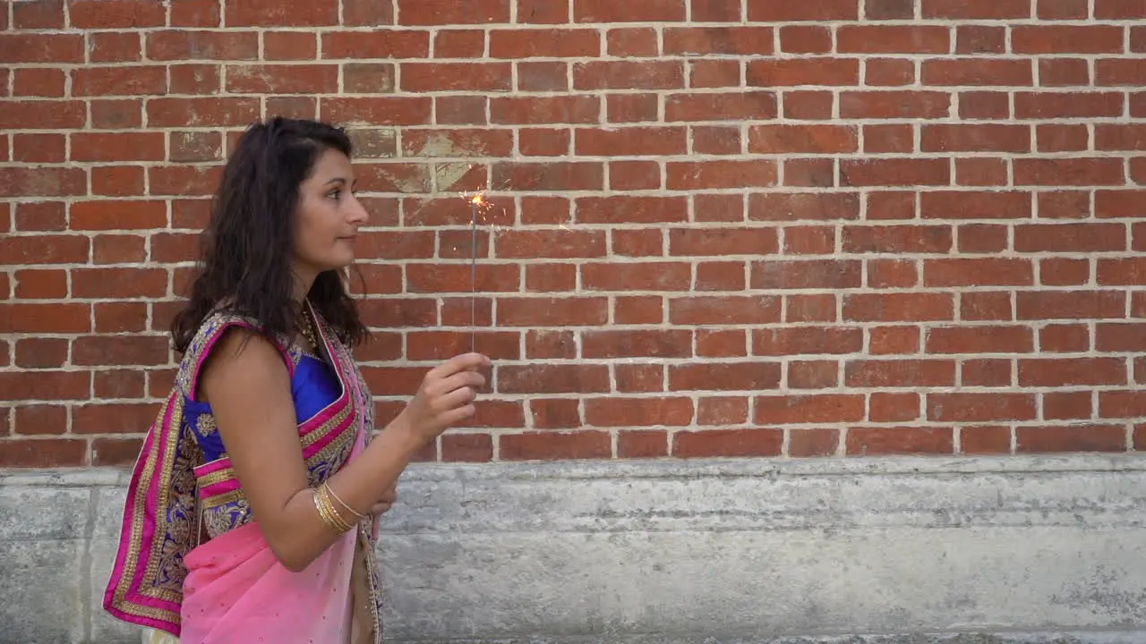 Girl in sari walking with sparkle slow motion