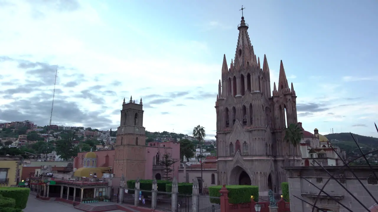 Cloudy morning sunrise in San Miguel de Allende Guanajuato Mexico Parroquia de San Miguel Arcángel clouds and pigeons background