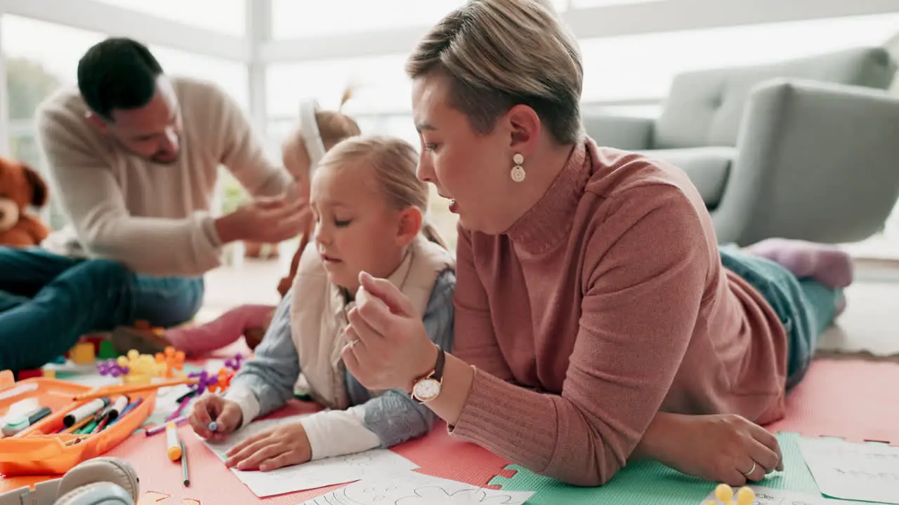 Mom dad and helping children with drawing