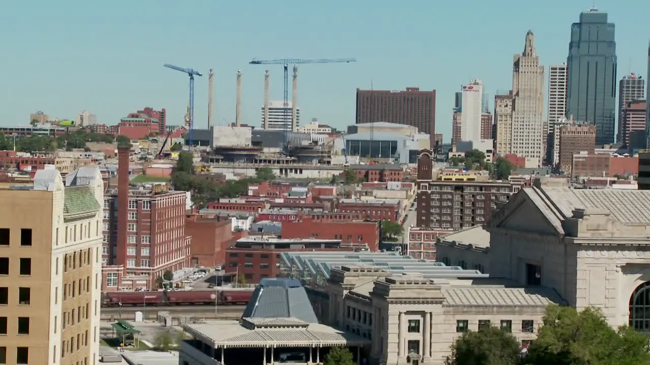 A daytime view of the Kansas City Missouri skyline including Union Station in foreground 4