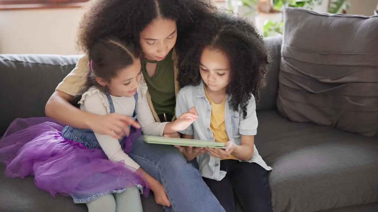 Mother girl kids and tablet on sofa with care