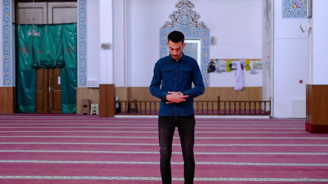 Young Man Worshiping In Mosque 4