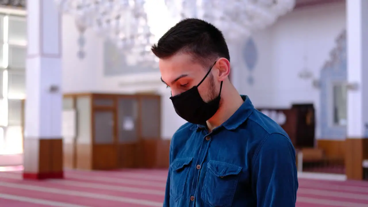 Teen Worships In A Mask In Mosque