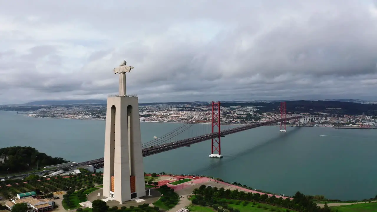 The statue of Jesus and the red bridge