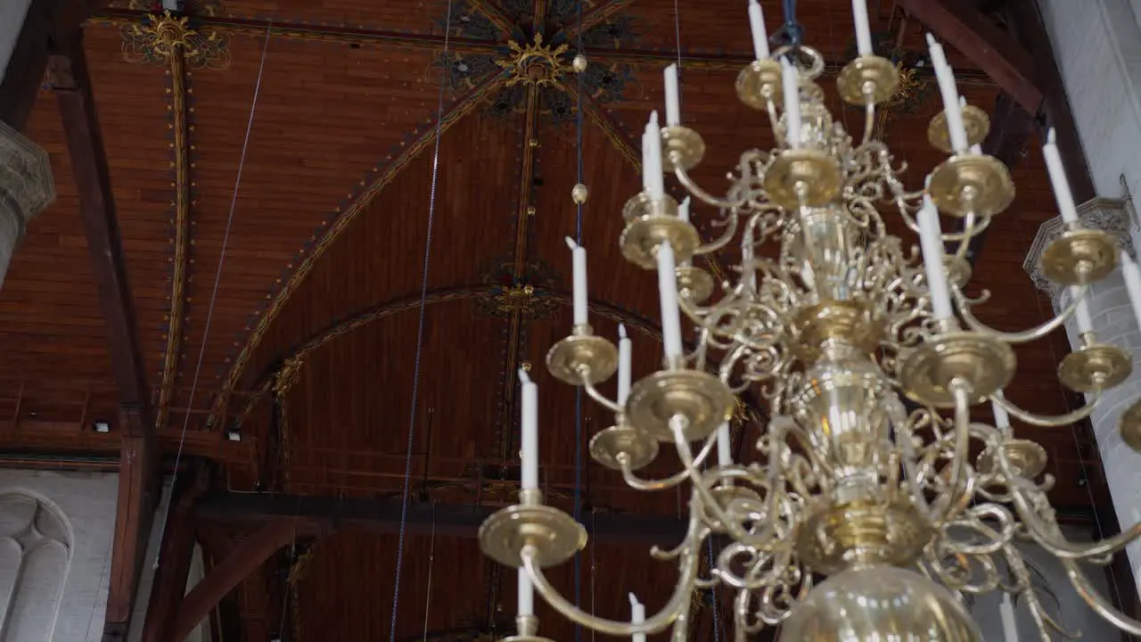 Chandelier inside Laurenskerk Rotterdam The Netherlands detailed wooden ceiling