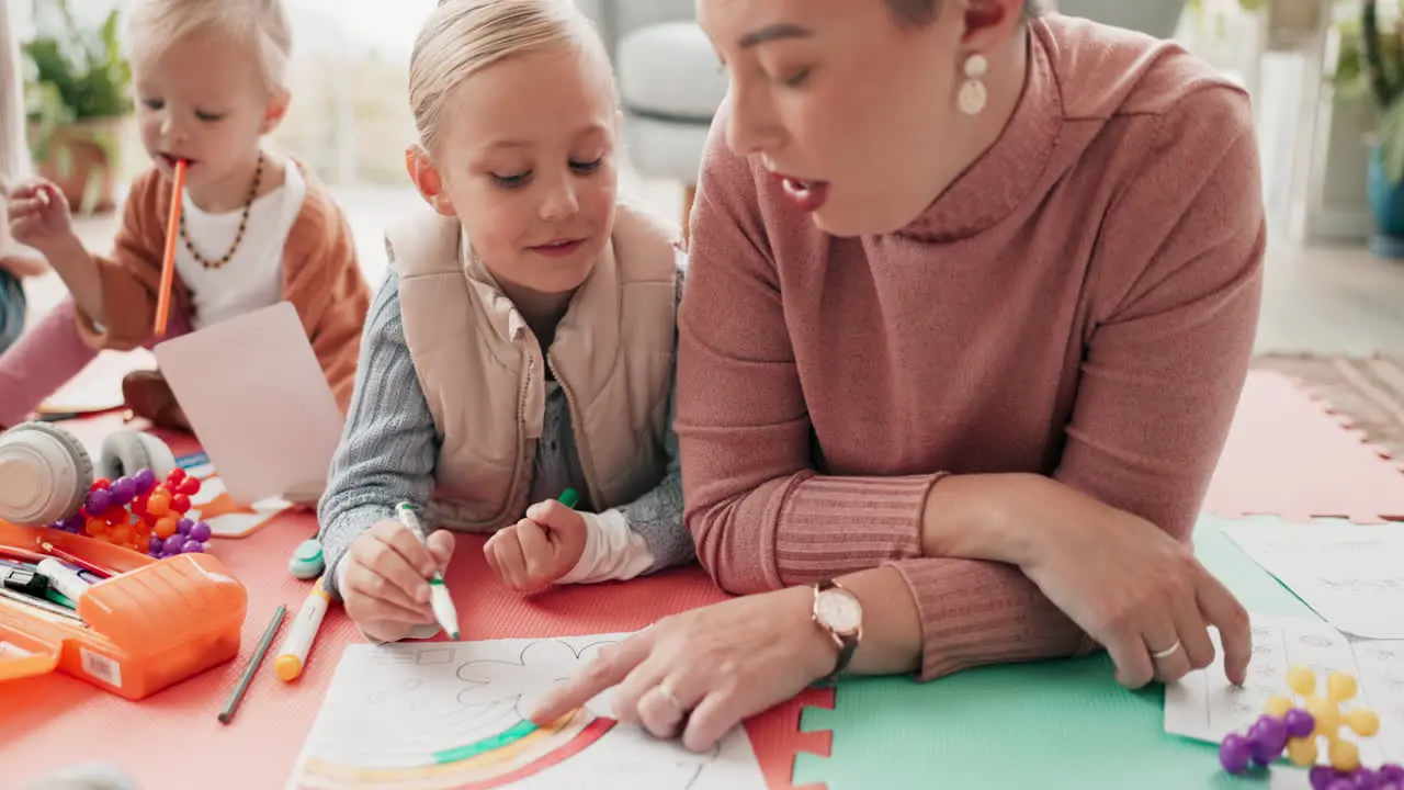 Mom dad and kids drawing on living room floor