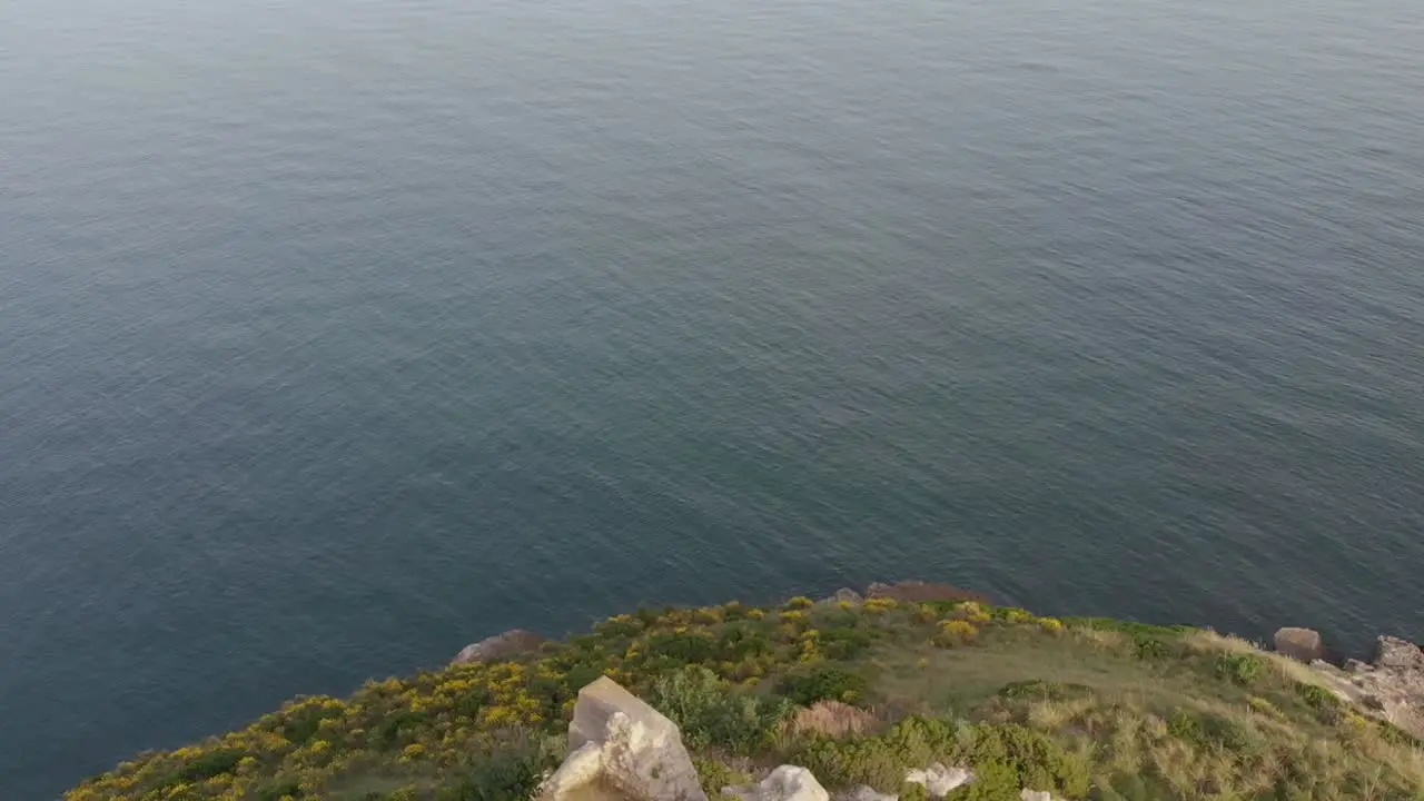 Aereal Shot Over The Coast Reveal Ancient Roman lookout tower