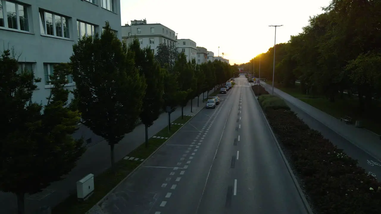 Modern Building Structures In A Row With Beautiful Green Lush Tree Landscape Along The City Road In Gdynia Seaport Poland During Early Morning