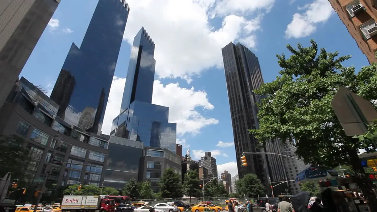 Busy Manhattan traffic on a sunny day on Columbus Circle in New York City