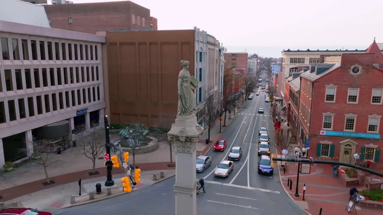 Statue in Lancaster City downtown square Marriott Hotel and convention center aerial drone in winter