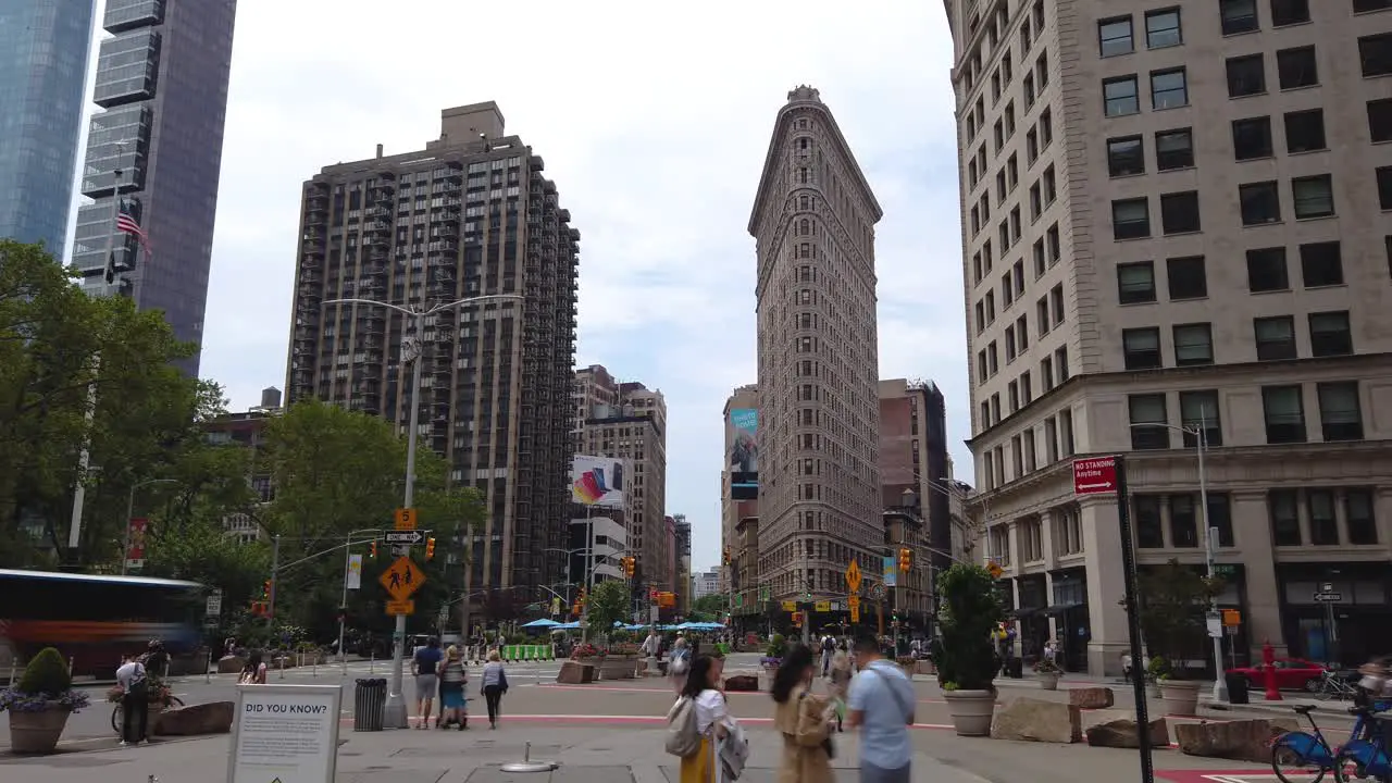 Time Lapse of Flatiron Building Intersection of 5th Avenue and Broadway on a sunny summer day New York City USA