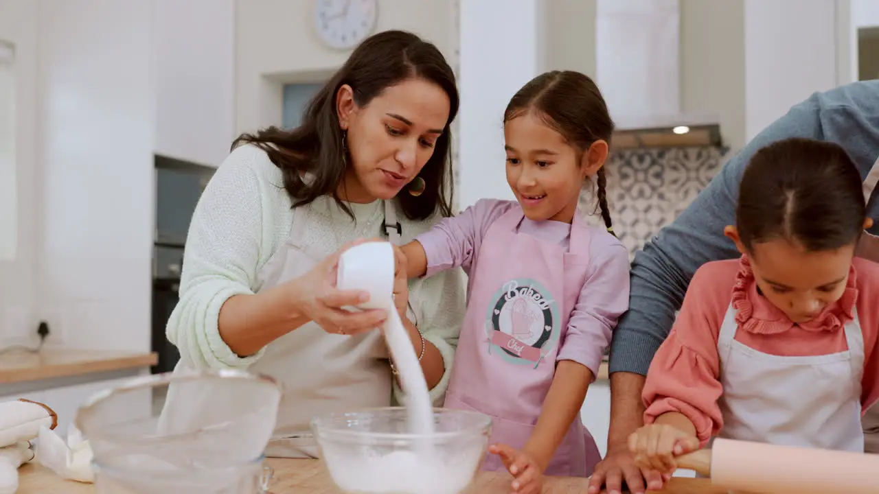 Kitchen sugar and happy family children baking