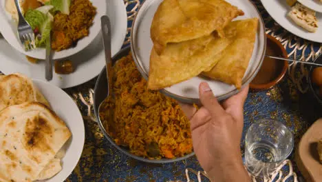 Close Up Of Food On Muslim Family Table At Home Set For Meal Celebrating Eid 4