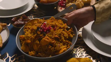 Close Up Of Food On Muslim Family Table At Home Set For Meal Celebrating Eid 3