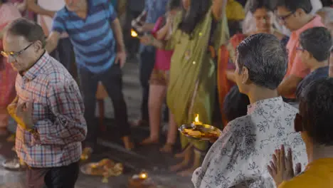 Close Up Of People Celebrating Hindu Festival Of Holi With Bonfire In Mumbai India 5