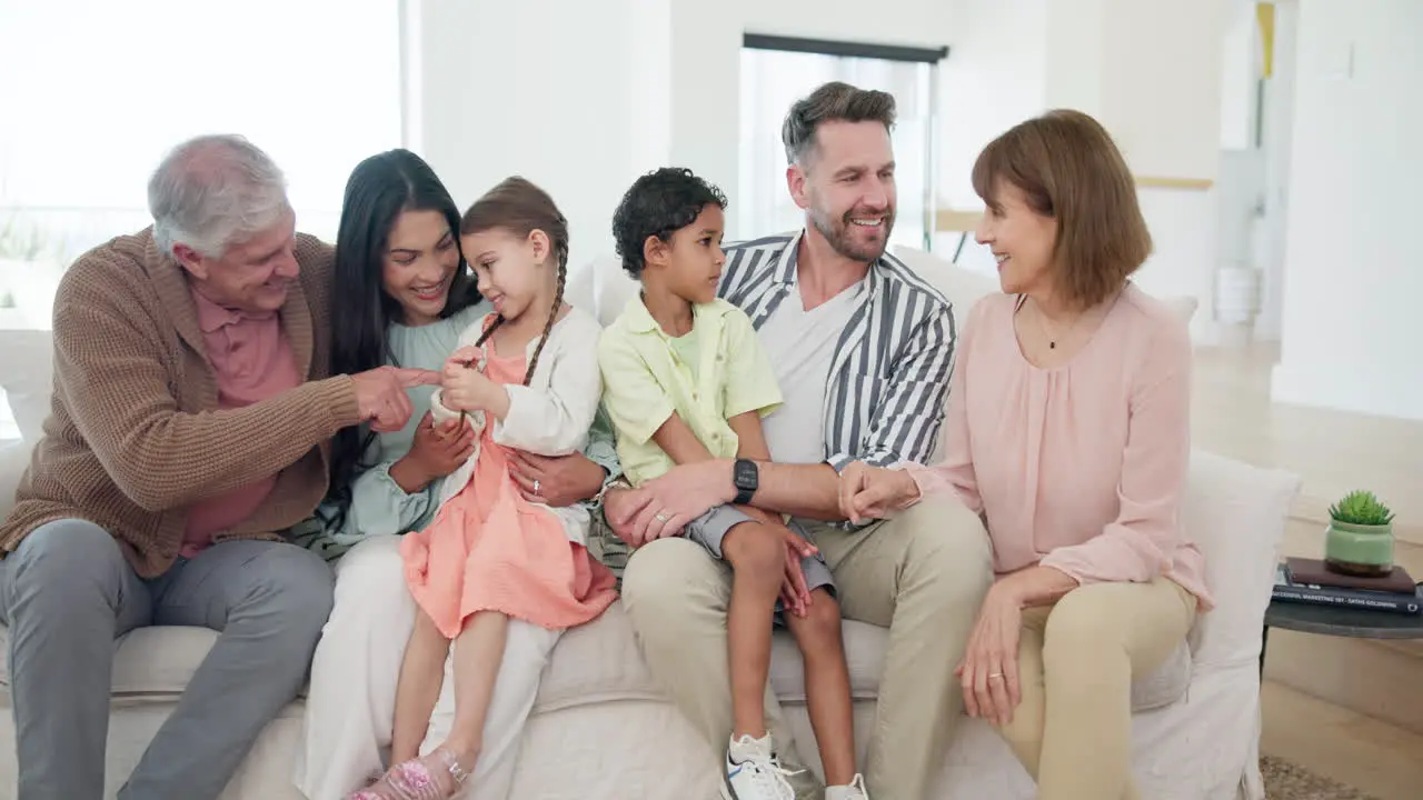 Big family kids and talking on sofa