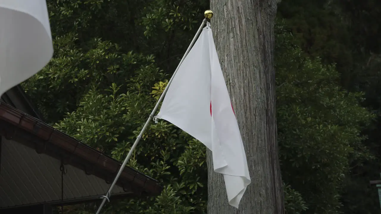 Japanese Flag Flying Slack in the Wind