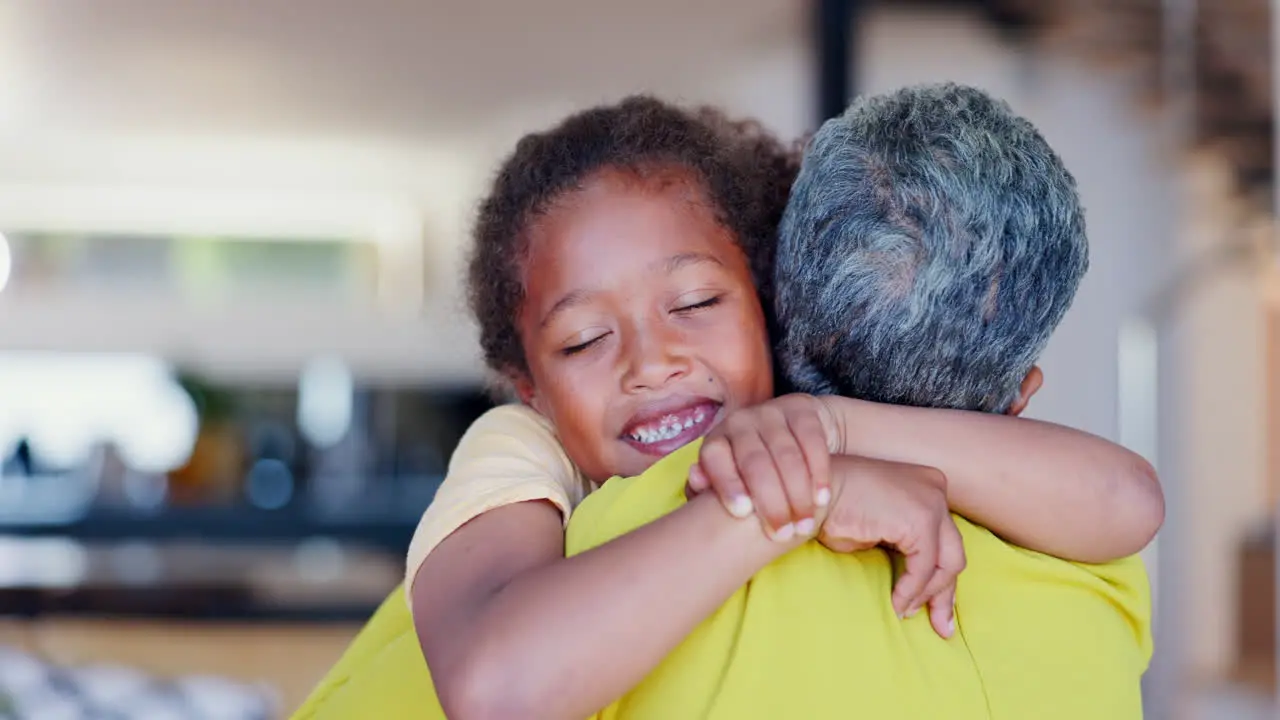 Happy grandmother or child hug in home