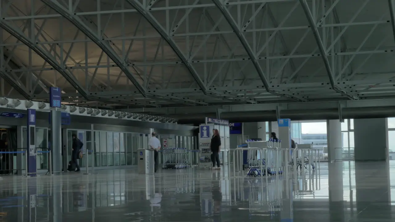 People walking to the train in airport