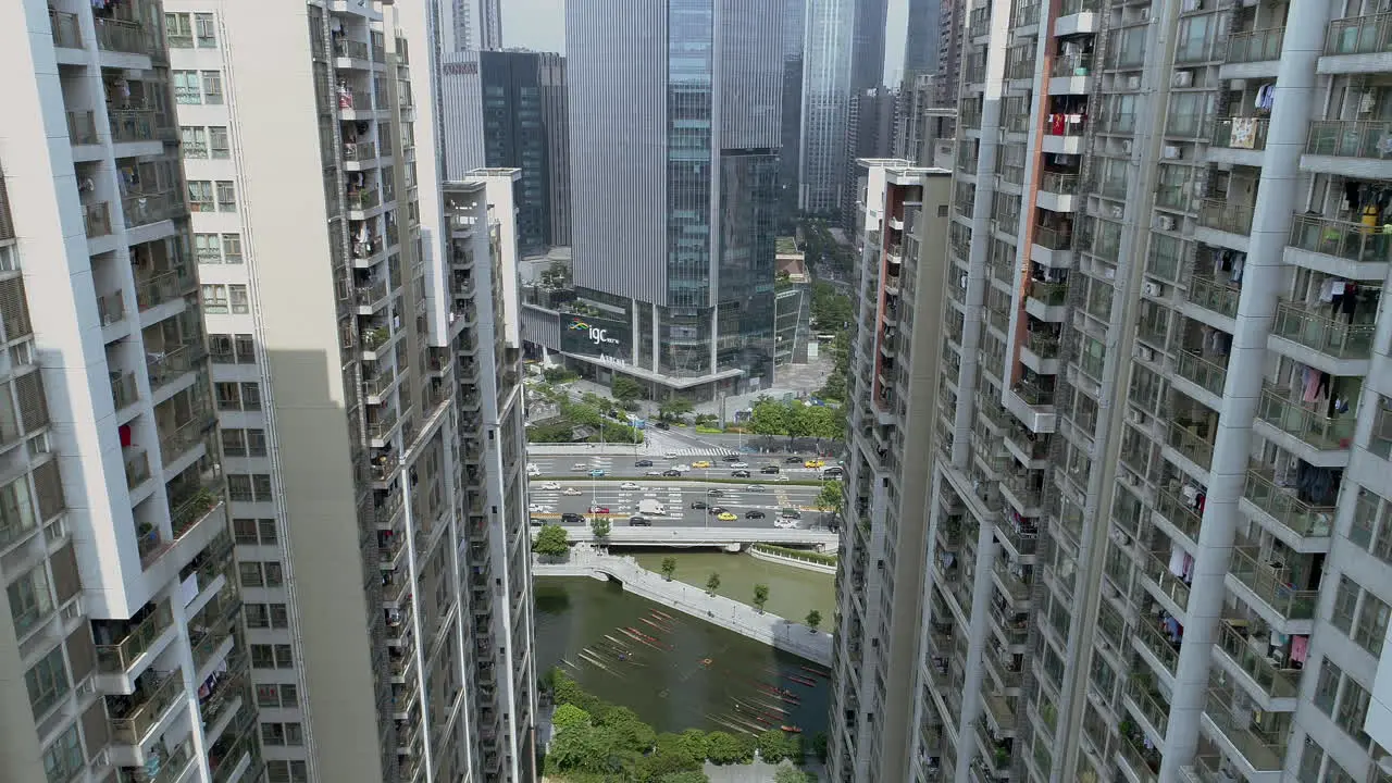 Guangzhou downtown living block with CBD area office building and a highway with dense traffic in the daytme