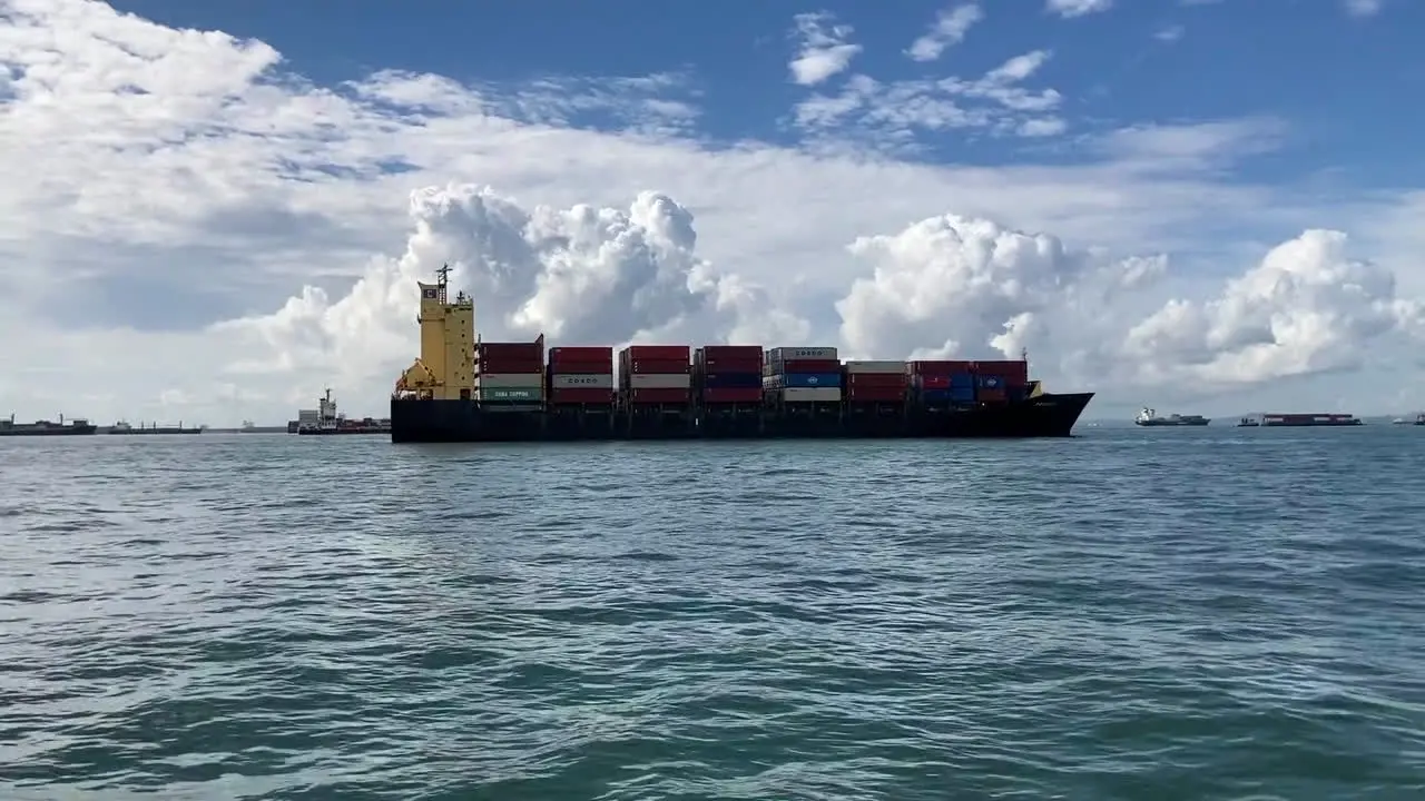 A container ship in the water's around Singapore waiting to enter the port