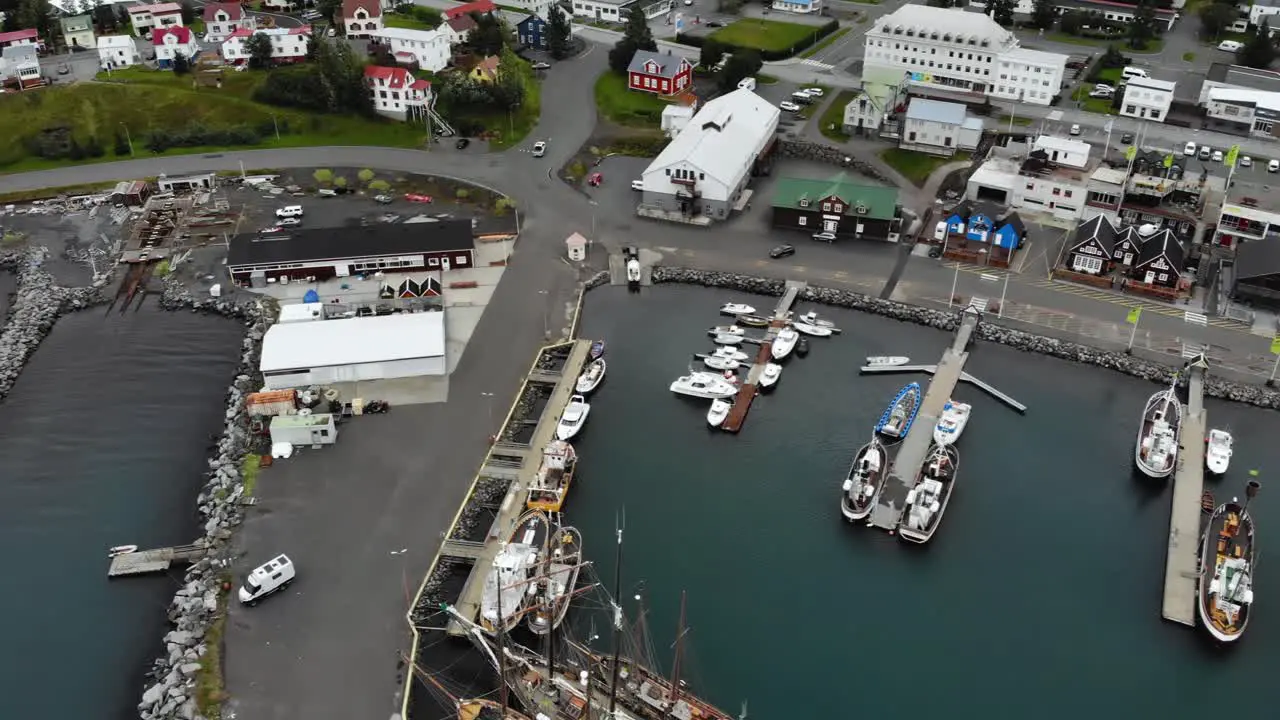 Aerial of boats in the harbour of Húsavík a small town in Iceland