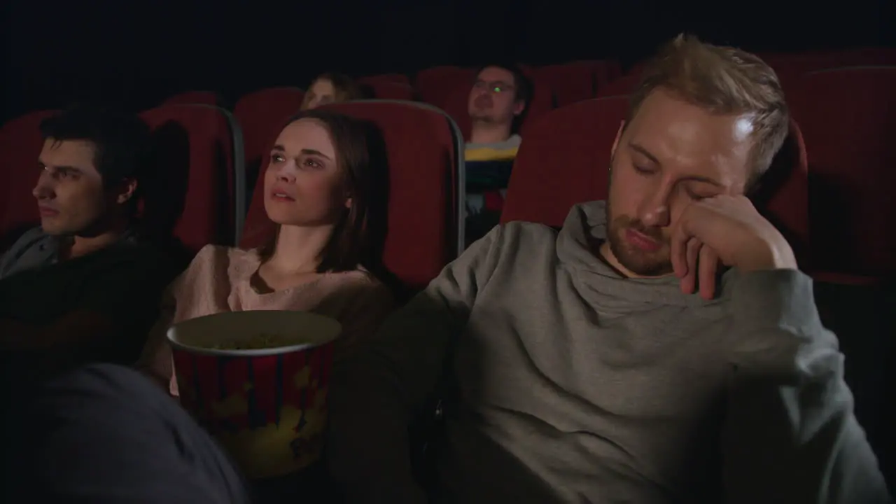 Man sleeping in the cinema