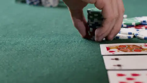 Tracking Close Up Approaching Pot as Poker Player Goes All In